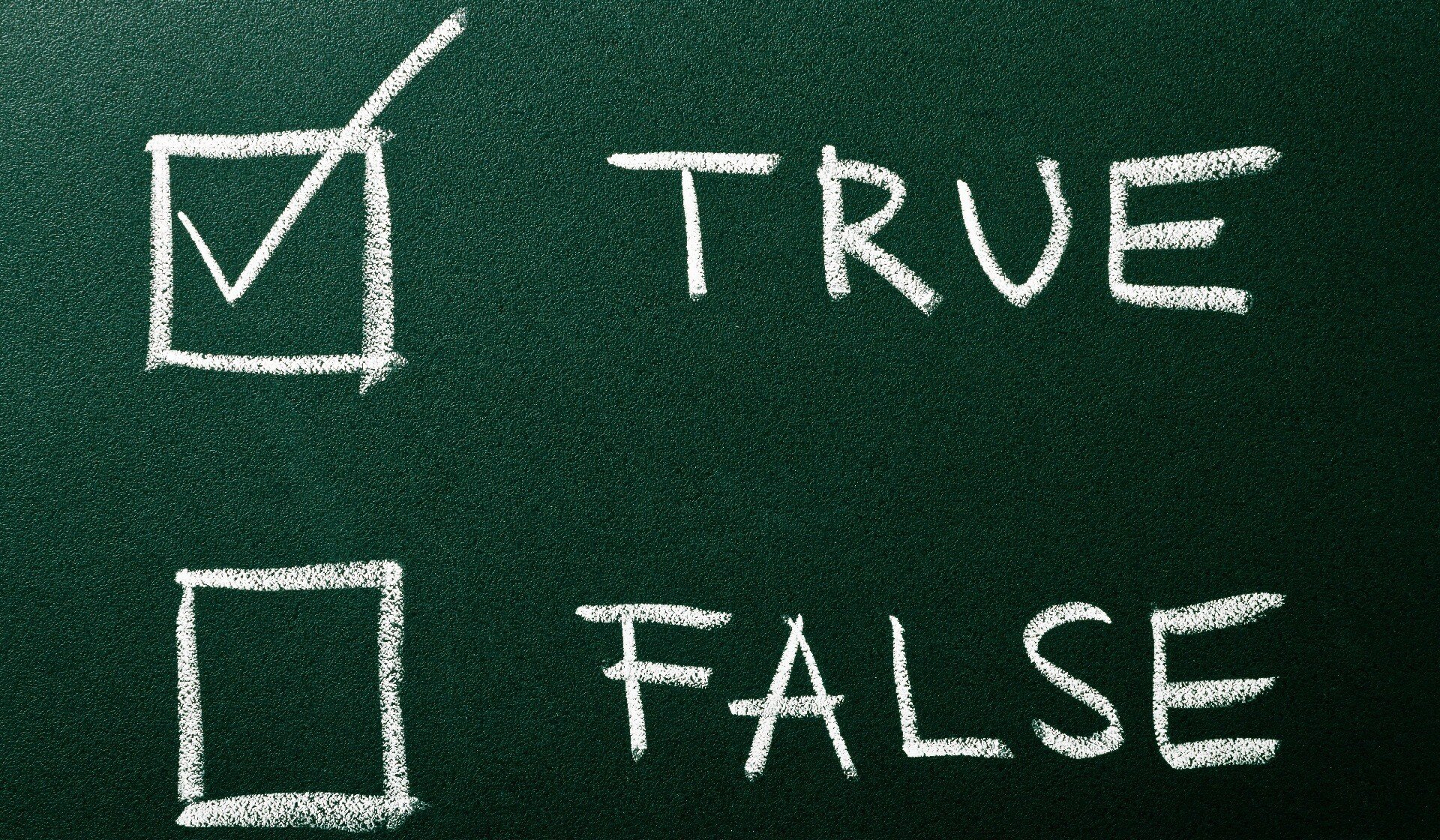 Questionnaire with two choices on green blackboard - true or false